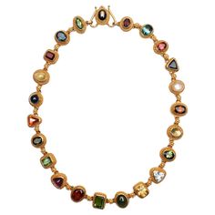 This multi -gemstone necklace by Santa Fe designer, Luna Felix is both arty and elegant. The twenty two links are a combination of round; oval; rectangular and triangular shapes. Among the stones are: moonstone; amethyst; garnet; citrine; aquamarine and various shades of tourmaline. Some stones are faceted; others are cabochon. Each is set with the Etruscan work gold beading characteristic of Felix's work. Her gold detailing is extraordinary. The necklace is 17 inches long and half an inch wide. Felix Jewelry, Felix Bulgari, Hand Jewelry Rings, Dope Jewelry Accessories, Multi Gemstone Necklace, Colorful Necklace, Twenty Two, Gem Necklace, Dope Jewelry