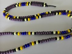 The 1971 Purple Cobra Necklace is made and designed exclusively by TheYaYaShoppe. This necklace incorporates only the finest vintage cast Czechoslovakian seed beads and hand made heavy weighted bead cord to keep all this goodness in uniform order. This necklace is secured with my signature knot and is a standard length of about 27 inches which slips right over your head with ease. Custom lengths are available upon request. Remember all you have to do is ask. Beads- Vintage purple, Blue, Vintage Adjustable Hippie Beaded Necklaces For Meditation, Hippie Adjustable Beaded Necklaces For Meditation, Hippie Beaded Necklaces For Meditation, Hippie Hand-strung Beads For Festivals, Adjustable Wooden Beads For Festivals, Adjustable Spiritual Beaded Necklaces For Festivals, Spiritual Adjustable Beaded Necklaces For Festivals, Adjustable Hippie Beads For Festivals, Adjustable Hippie Festival Beads