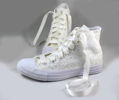 "Ivory Lace High Top Converses --Bridal Converses -- Wedding Tennis shoes - Wedding Converse High Top-- Custom Converses For the girl who wears her Converses to every occasion.... why shouldn't you wear them to your wedding? Skip down the aisle in comfort in these beautiful MonoChrome Ivory lace Converses! Pictured with white Monochrome Converses with ivory lace and ivory ribbon shoelaces. Alternate ribbon shoelace colors are available upon request. Also available in ivory or champagne lace upon White Lace-up Wedding Shoes For Bridal Shower, Cream Lace-up Wedding Shoes For Ceremony, Round Toe Lace Wedding Shoes, Round Toe Wedding Shoes With Laces, Cream Closed Toe Wedding Shoes With White Laces, Lace-up Wedding Shoes With Laces, White Round Toe Wedding Shoes For Bride, Cream Wedding Shoes With Laces And Round Toe, Cream Round Toe Wedding Shoes For Bride