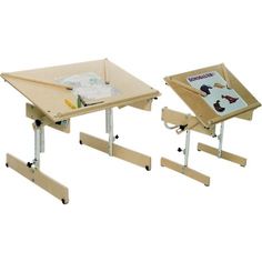 two children's desks with one child's drawing table on the other