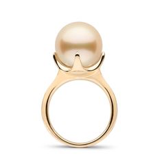 The Oracle Collection ring features a large 11.0-12.0 mm, AAA quality Golden South Sea pearl, prominently displayed in the contoured embrace of it's sleek setting. Like a vision of the divine, this ring "speaks" the wisdom of the truest kind of simple, natural beauty. Golden South Sea pearls are among the most sought-after pearls in the world. They are also the most rare, growing in only a few remote locations around the world. The golden pearl set in this ring was grown in the warm, tropical wa Pearl Ring Design, South Sea Pearl Ring, Golden Jewellery, Fine Pearl Jewelry, Diamond Bracelet Design, Golden South Sea Pearls, Jewelry Appraisal, Golden Jewelry, Golden Ring