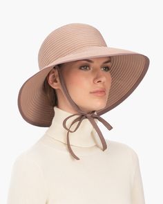 If you need a year round sun protection hat, consider this soft women's crusher of row on row spiral stitched grosgrain ribbon that will take you from summer into fall and back again. The gently downturned brim can be worn in a variety of positions, which flatters most face shapes. Self chin ties secure Ribbon Skimmer on the windiest of days, either under the chin or behind a ponytail in back. Simply tuck chin ties inside the hat's crown, when not in use. Brim Span: 4"(10.2cm) Highest sun protec Packable Curved Brim Bucket Hat For Spring, Lightweight Sun Hat With Curved Brim, Packable Short Brim Bucket Hat For Spring, Spring Packable Bucket Hat With Short Brim, Adjustable Packable Bucket Hat For Spring, Spring Boater Hat With Upf 50+ For Outdoor, Spring Outdoor Boater Hat With Upf 50+, Packable Sun Hat With Curved Brim, Upf 50+ Boater Hat For Spring Outdoor Activities