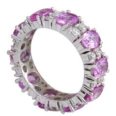 Stamped: 14K White Gold Total Ring Weight: 4.5 Grams Gemstone Weight: Total Natural Ceylon Sapphire Weight is 6.03 Carat (Measures: 6.00x4.00 mm) Quantity: 10 Color: Pink Diamond Weight: Total Natural Diamond Weight is 1.68 Carat quantity: 20 Color: F-G, Clarity: VS2-SI1 Face Measures: 6.10 mm Sku: [702482W] Luxury Pink Sapphire Rings With Gemstone, Luxury Pink Sapphire Ring For Formal Occasions, Luxury Multi-stone Pink Sapphire Ring, Elegant Multi-stone Pink Sapphire Diamond Ring, Platinum Ruby Ring With 17 Jewels, Luxury Pink Sapphire Ring With Vvs Clarity, Luxury Vvs Clarity Pink Sapphire Ring, Exquisite Pink Sapphire Rings For Formal Occasions, Exquisite Pink Sapphire Rings For Formal Events