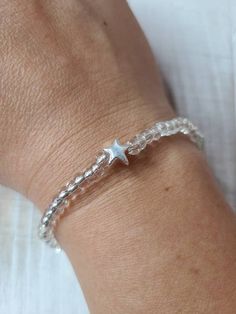 Check out this item in my Etsy shop https://www.etsy.com/listing/1161899954/make-a-wish-beaded-bracelet Silver Beaded Bracelet With Star Charm For Gift, Handmade Star Charm Bracelet Adjustable, Silver Beaded Bracelets With Star Charm As Gift, Silver Beaded Bracelet With Star Charm As Gift, Handmade Star-shaped Adjustable Charm Bracelet, Silver Star Bracelet For Friendship, Silver Beaded Star Bracelets, Adjustable Star Charm Bracelet For Gifts, Adjustable Charm Bracelet With Star Charm For Everyday