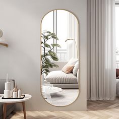 a living room with a large mirror on the wall next to a couch and coffee table