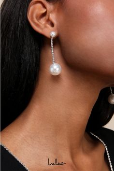 Everyone is sure to covet your look in the Lulus Stunning Design Silver Pearl Rhinestone Drop Earrings! These radiant earrings are composed of silver-toned metal, with faux pearl studs that support a length of slender rhinestone chains, with a second oversized faux pearl that dangles at the end. Post backs. 2. 25" long. 60% Brass, 10% Glass, 30% Acrylic Pearl. Imported. Lulus | Stunning Design Silver Pearl Rhinestone Drop Earrings. Drop Earrings Pearl, Pearl Statement Earrings, Silver Pearl Earrings, Earrings Pearl, Accessories Jewelry Earrings, Design Silver, Rhinestone Earrings, Pearl Studs, Silver Pearls