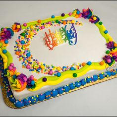 a birthday cake that is decorated with confetti