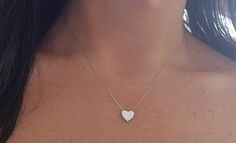 14K SOLID WHITE GOLD HEART NECKLACE Here is a dainty, delicate and simple, yet classy minimalist Heart Necklace.This is a 14k Solid White Gold open back heart necklace. (We do not sell filled or plated jewelry) Perfect for everyday use. Also available in 14k Yellow Gold. https://www.etsy.com/listing/749228903/14k-yellow-gold-heart-necklace?ref=listings_manager_grid Metal : 14K Solid Gold Necklace Length : 17 inches / 42.5cm Pendent Height : 9.10mm Pendant Width : 10.00mm Shipping Policy Item wil White Minimalist Jewelry With Heart Charm, Minimalist White Heart Charm Jewelry, Minimalist White Heart Necklace For Wedding, White Heart-shaped Minimalist Jewelry, Minimalist White Heart-shaped Jewelry, Minimalist White Necklace For Valentine's Day, Minimalist White Heart Necklace For Everyday, Everyday White Necklace For Valentine's Day, Minimalist White Heart Cut Jewelry