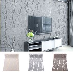 the wall paper is designed to look like branches