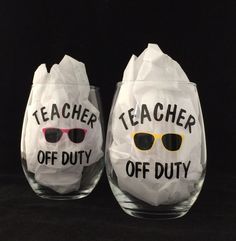 two glasses with the words teacher off duty written on them