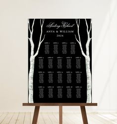 a wedding seating chart with trees on it