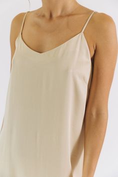 Design Details Care Size & Fit This strappy slip dress has been a best selling style for years - and for good reason! It has a relaxed fit and is made in our luxuriously soft, lightweight and eco-friendly TENCEL™. Layer it over a turtleneck while it's still cold, then wear it with sandals and a jean jacket once the weather warms up. Machine wash cold or up to 86° F / 30° C Hang dry or tumble low heat Dry Clean Optional True to size fit, take your normal size 100% TENCEL™ Modal Vegan Non-toxic, A Spring Cami Slip Dress, Chic Viscose Slip Dress With Spaghetti Straps, Adjustable Straps Slip Dress For Day Out, Chic Solid Dresses For Layering, Summer Layering V-neck Dress, Chic Viscose Slip Dress For Spring, Summer V-neck Dress For Layering, V-neck Summer Dresses For Layering, Casual Camisole Slip Dress For Spring