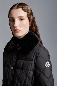 Designed for sophisticated women with a timeless style, the Cygne down jacket is easily layered over workwear and weekend leisure looks. Crafted from recycled polyester, the short puffer boasts geometric quilting and a nipped-in, belted silhouette. The lightweight style is finished with a detachable faux fur collar. Designer Long Sleeve Outerwear With Faux Fur Trim, Designer Winter Quilted Jacket With Padded Collar, Luxury Winter Outerwear With Padded Collar, Designer Quilted Jacket With Padded Collar For Winter, Outdoor Trekking, Personalized Jacket, Ski Pants, Faux Fur Collar, Shell Jacket