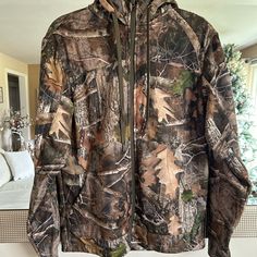 Great Outdoor Zip Up Jacket, Never Worn New W/O Tags Long Sleeve Sport Coat For Outdoor Fall Activities, Camouflage Long Sleeve Windbreaker For Fall, Long Sleeve Camouflage Windbreaker For Fall, Winter Hunting Long Sleeve Sport Coat, Long Sleeve Winter Hunting Outerwear, Winter Hunting Sport Coat With Long Sleeves, Fall Hunting Outerwear With Fleece Lining, Fall Hunting Hooded Jacket, Casual Windproof Hunting Outerwear