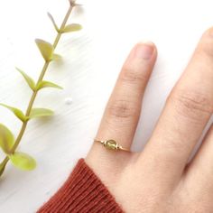 ✨ Dainty Peridot Ring ✨14K Gold Filled - Sterling Silver Wire Wrapped Peridot Stacking Ring, Birthstone Jewelry💚 Peridot, the August birthstone, is the stone of positive power. It symbolizes the sun, the source of all abundance.Sizing: •Gemstone Diameter: 4 mm•Ring Band:  0.8 mm • Handmade in your ring size with natural Peridot bead and 14K gold-filled wire or Sterling Silver• 14K gold-filled and sterling silver wire is known for its lasting quality. This ring will last for decades and is consi August Birthstone Ring, May Birthstone Rings, Gold Stacking Ring, Gold Pearl Ring, Freshwater Pearl Ring, Ring Birthstone, Sterling Silver Wire Wrap, August Birthstone, Gold Ring Stack