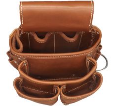 the inside of a leather purse with multiple compartments and straps on it, showing the interior pocket