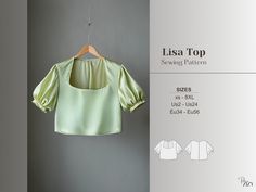 an image of a blouse hanging on a clothes hanger with the measurements below it