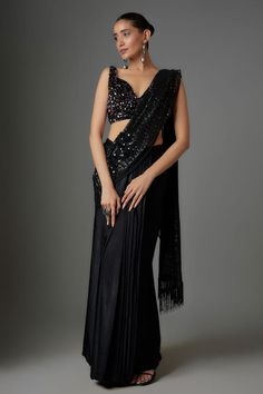 Black pre-stitched saree with sequin embellished pallu. Comes with padded embellished blouse. - Aza Fashions Elegant Fitted Pre-draped Saree With Mirror Work, Fitted Silk Pre-draped Saree With Sequins, Fitted Draped Blouse For Party, Draped Fitted Party Blouse, Evening Pre-draped Fitted Saree With Mirror Work, Embellished Fitted Saree, Evening Fitted Pre-draped Saree With Mirror Work, Fitted Evening Pre-draped Saree With Mirror Work, Elegant Fitted Embellished Blouse Piece