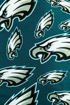 the philadelphia eagles'logo is shown on this green jerseying material, which has white and