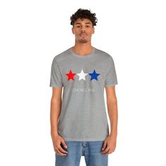 Get ready for summer. Show your Edmonds patriotic spirit with this red white and blue star design. Perfect for the beach and summer BBQs in normaltown USA - get out and Love Edmonds! This classic unisex jersey short sleeve tee fits like a well-loved favorite. Soft cotton and quality print make users fall in love with it over and over again. These t-shirts have-ribbed knit collars to bolster shaping. The shoulders have taping for better fit over time. Dual side seams hold the garment's shape for Star T Shirt, Get Ready For Summer, Star Design, Blue Star, Star Designs, Red White And Blue, Jersey Shorts, Cotton Fiber, Fall In Love