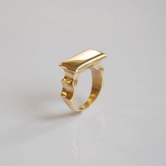 This signet ring is a flat top ring, a rectangular shaped. I designed this signet ring in an elegant geometric form.  This signet ring is a beautiful statement ring, made of solid 14k gold. This signet ring has a strong presence. This ring is a beautiful pick up for a daytime apparel and perfect for a night out in town.  This 14k gold ring makes a genuine statement that can not be ignored! I sculptured this ring in wax to perfection and molded it in one piece.  The ring has a classic shape that combines comfort and beauty to make this jewelry perfect for you or anyone you care!   Features  ❇ Made of solid 14k yellow/white/rose gold (Choose during check out) ❇ Height (from the finger up): 5mm / 0.19'' (The ring height depending on the ring size) ❇ Width: 22.5mm / 0.88'' (The ring width depe Big Gold Ring, Ring For Women Unique, Wide Gold Ring, Rectangular Ring, Ring Geometric, Wax Ring, Ring Inspo, Unusual Rings, Wax Carving