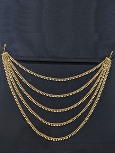 Multi layer gold bead / pearl bead dangle Side Hip Chain.  Hip chain to be worn on the side when wearing a saree / lehenga.  Indian Traditional Hip Belt. Hip Belt Chain / Waist belt / Belly chain.  Base material is made of copper alloy. Gold plated grand hip chain.  End to end length: 18 inches. Center height: 10.5 inches. Chain Waist Belt, Hip Chain, Lehenga Indian, Belt Chain, Saree Lehenga, Hip Belt, Layered Chains, Indian Aesthetic, Belly Chain