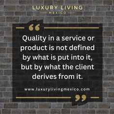 a brick wall with the quote quality in a service or product is not defined by what is put into it, but by what the client drives from it