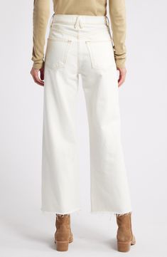 Goldtone hardware and contrast stitching elevate kicky wide-leg jeans that have frayed raw hems for added style points. 27" inseam; 22" leg opening; 12" front rise; 16" back rise (size 29) Zip fly with button closure 100% cotton Machine wash, tumble dry Made in the USA of imported fabric Mid-rise White Denim Wide Leg Pants, Wide Leg Cropped Jeans With Frayed Hem For Fall, Fall Wide Leg Cropped Jeans With Frayed Hem, Wide Leg Jeans With Frayed Hem For Fall, Fall Wide Leg Jeans With Frayed Hem, Wide Leg Flare Jeans With Frayed Hem For Fall, Fall Flare Jeans With Frayed Hem And Wide Leg, White High-rise Flare Jeans With Frayed Hem, White High Rise Flare Jeans With Frayed Hem