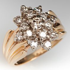 This charming cluster style ring features fifteen (15) round brilliant cut diamonds in prong settings. The ring measures 15.8mm at the top, rises 8.9mm above the finger, tapering to 2.1mm wide and 0.9mm thick at the base of the shank. This ring is currently a size 5.75. Cluster Setting Rings, Vintage Cluster Ring, Cluster Diamond Ring, Cluster Rings, Diamond Cluster Ring, Gold Collection, Diamond Cluster, Brilliant Diamond, Gold Engagement Rings