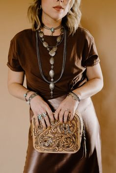 Beautiful, delicate stamped Concho belt from the 1920’s, would be amazing worn as a lariat necklace Approximately 32” in length Conchos approximately 1.5 x .5” 65 grams Beautiful vintage patina Western Style Gold Lariat Jewelry, Elegant Concho Jewelry For Festival, Bohemian Concho Lariat Necklace, Vintage Lariat Jewelry, Bohemian Lariat Concho Necklaces, Bohemian Lariat Concho Necklace, Bohemian Gold Jewelry With Concho, Gold Bohemian Jewelry With Concho, Western Lariat Jewelry For Festival