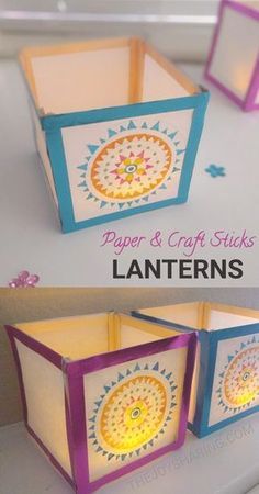 paper and craft sticks lanterns are sitting on top of a table with the words lantern in front of them