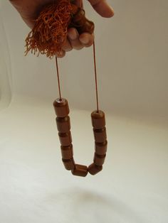 "Vintage folk Greek big handmade wooden decorative worry beads \" koboloi\" Good vintage condition. Full Length with cord 30 cm. All my packages are registered and you will be olso receiving tracking number. Please ask if you have any questions. Visit our shop for more colector's items. https://www.etsy.com/shop/prestigiousantiques?ref=hdr" Artisan Wooden Beads For Festivals, Traditional Wooden Beads For Rituals, Brown Wooden Beads For Festivals, Traditional Large Brown Beads, Traditional Brown Beads For Rituals, Traditional Brown Large Beads, Worry Beads, Modernist Ring, Modernist Jewelry