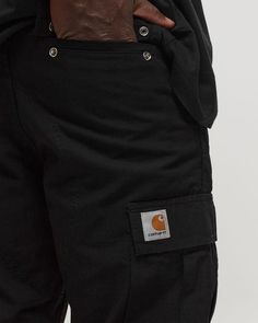 Regular Cargo Pant Black Cotton Work Pants With Side Pockets, Black Cotton Cargo Pants With Hip Pockets, Casual Black Work Pants With Patch Pockets, Black Urban Work Pants With Hip Pockets, Urban Black Work Pants For Streetwear, Urban Black Work Pants With Hip Pockets, Black Urban Work Pants, Black Outdoor Pants With Patch Pockets, Black Cotton Work Pants With Hip Pockets