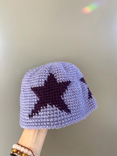 a crocheted hat with a star on it