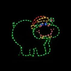 an elephant with christmas lights on it's back