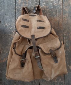 RARITY Rare antique German Backpack ... unusually beautiful & special. Made in the 1940s from canvas. Nice with two patch pockets, an inside pocket and sturdy straps. Rarely good and robust workmanship with an additionally reinforced base. A really unusually beautiful & very special backpack with signs of wear and age and stains from use as well as open seams on the carrying straps. Height : approx. 46 cm / 18.11" Width : approx. 47cm / 18.50" Floor : approx. 47 x 9.5 cm / 18.50 x 3.74" Material: canvas PLEASE enlarge my pictures & please use the zoom function so you can clearly see the condition & any signs of use & age. If you are unsure, please contact me. I would be happy to send you more detailed pictures. IMPORTANT : When purchasing multiple items in the shop, the shipping costs are Vintage Travel Backpack With Leather Handles, Vintage Canvas Satchel Backpack, Vintage Waxed Leather Satchel Backpack, Vintage Leather Satchel Backpack With Waxed Finish, Vintage Backpack With Leather Handles For Everyday, Vintage Backpack With Leather Backing, Vintage Canvas Bag With Leather Backing, Vintage Canvas Backpack With Adjustable Strap, Vintage Leather Backpack With Leather Patch For Adventure