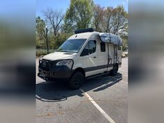 an rv is parked in a parking lot