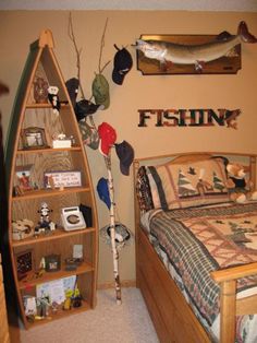 a bed room with a neatly made bed next to a book shelf filled with books