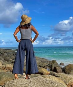 "Blue Stripe Cotton Palazzo Pants for Women Beautiful pants made with very soft cotton with stripe pattern, So so comfy and very flattering shape. Made with 100% soft double gauze cotton. Sizing: Made in one size to fit S to XL / US: 2/4/6/8/10/12/14/16 Measurement; Elastic waist 23 \"- 48\" Hip max 50\" Rise 11.5\" Length outseam 36\" Length inseam 24\" **Model is a size US 6. 5'4\" Tall. This pant will fit a range of Size (US) 4 to 16 Description: The fabric is super soft and has a beautiful l Blue Straight Leg Harem Pants For Summer, Blue Harem Pants For Vacation, Blue Cotton Beach Pants, Navy Wide-leg Pants With Elastic Waistband, Blue Trousers For The Beach, Beach Denim Bottoms With Pockets, Blue Wide Leg Pants For Beach With Pockets, Blue Wide Leg Beach Pants With Pockets, Blue High-waisted Cotton Harem Pants