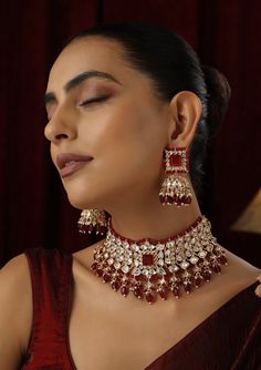 Make a striking statement with this Red Polki Choker set, featuring radiant red stones set in traditional Polki design and finished with a luxurious rose gold touch. The elegant choker design offers a contemporary twist on classic beauty, with the rose gold accents enhancing the deep red hues. Ideal for weddings, festive occasions, or any special event, this set brings together timeless sophistication and modern flair. Polki Choker Set, Choker Design, Hand Jewelry Rings, Gold Touch, Polki Choker, Chain Braid, Elegant Choker, Choker Designs, Radiant Red