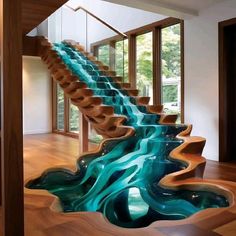 the stairs are made out of wood and have blue water flowing down them to the floor