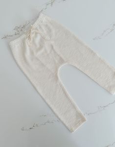 Textured Joggers - Oat – BeeBeeBabyBoutique Soft-washed Bottoms For Spring Loungewear, Cotton Harem Pants With Elastic Waistband For Loungewear, Soft-washed Cotton Pants For Spring, Soft-washed Stretch Cotton Bottoms, Spring Soft-washed Cotton Pants, Soft-washed Pants For Spring Loungewear, Summer Relaxation Sweatpants With Elastic Waistband, Casual Cotton Bottoms For Relaxation, Casual Cotton Harem Pants For Relaxation