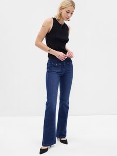 Fit: Snug & flattering through the hip & thigh with a flared leg. ​ Fabric: 86% Cotton, 13% Recycled Materials, 1% Stretch.  Stretch: High Stretch Jeans.  Innovative stretch with high recovery.  Made to move & always bounces back. ​ Rise: High Rise Jeans.  Look: A four-pocket jean in dark indigo wash.  Details: Zip fly with button-flap patch pockets at front & back.  Responsibly Made: This pair of jeans is part of our water-saving Washwell program.  Compared to conventional wash methods, Washwel Jeans Look, Water Saving, Dark Indigo, Pocket Jeans, Casual Style Outfits, High Rise Jeans, Petite Size, Fast Fashion, Stretch Jeans