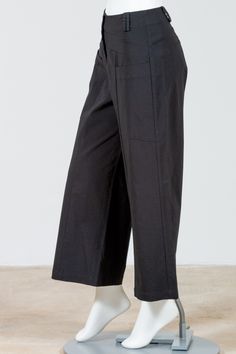 Habitat's City Capri Pant is a zip up stretchy pant in a wrinkle free fabric. High waisted with belt loops, the leg is wide and falls above the ankles on most. Two front patch pockets sit at top of leg. Super comfortable and holds shape to wear all day long! Made in ChinaFabric: 71% Rayon, 26% Nylon, 3% SpandexCare: Machine Wash Cold, Tumble Dry Low See Habitat's Sizing guideline here >Measurements - Approximate, measured flat and unstretched: Medium (M): Waist 32", Hips 38", Length 36.5", Insea Black Relaxed Fit Cropped Leg Capris, Versatile Cropped Leg Pants With Pockets, Versatile Cropped Pants With Side Pockets, Workwear Capris With Pockets And Loosely Fitted Hips, Versatile Relaxed Fit Parachute Pants For Workwear, Versatile Capris With Pockets For Fall, Fall Workwear Capris With Pockets, Versatile Fall Capris With Pockets, Versatile Workwear Parachute Pants With Relaxed Fit