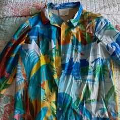 Vibrant Multi Colored Collared Button Up Shirt. Brand New And Never Worn, But Without Tags. Size = Fr34. Originally Purchased To Wear On Vacation But Never Arrived In Time! Summer Long Sleeve Multicolor Shirt, Multicolor Long Sleeve Summer Shirt, Summer Multicolor Long Sleeve Shirt, Multicolor Button-up Summer Shirt, Long Sleeve Shirt With Tropical Print For Spring, Multicolor Button-up Summer Blouse, Yellow Beach Shirt With Button Closure, Beach Yellow Shirt With Button Closure, Yellow Buttoned Vacation Top