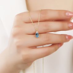 Your Oval Cut Blue Topaz Pendant is stylish, dainty and pretty ideal for everyday use. Details of solid gold handmade Swiss Blue Topaz Jewelry are very eye-catching. It is a great gift for your loved ones. This jewelry will be an indispensable piece of yours. This meaningful Birthday Gift with high quality handwork will be a legacy you can leave to your family its. * Swiss Blue Necklace Details * Material / Gold Kt : This elegant necklace is made of 14k and 18k Solid Gold * Available Gold Colors : Yellow Gold, White Gold, Rose Gold * Swiss Blue Topaz Size : 5X7 mm * Chain Length Options :  - 14 Inches - 35,56 cm - 15 Inches - 38,10 cm - 16 Inches - 40,64 cm - 17 Inches - 43,18 cm - 18 Inches - 45,72 cm - 19 Inches - 48,26 cm - 20 Inches - 50,80 cm - 21 Inches - 53,34 cm - 22 Inches - 55,88 Elegant Oval Aquamarine Necklaces, Elegant Oval Aquamarine Necklace, Elegant Aquamarine Necklace, Elegant Topaz Oval Pendant Necklaces, Elegant Oval Pendant Jewelry With Blue Topaz, Elegant Oval Blue Topaz Pendant Jewelry, Elegant Topaz Oval Pendant Necklace, Aquamarine Necklace With Diamond Accents For Gift, Elegant Oval Pendant Topaz Necklace