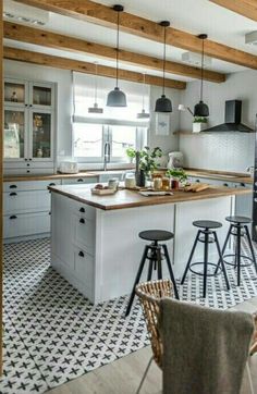 the kitchen is clean and ready to be used as a dining room or living area