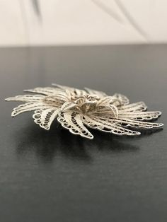 This stunning floral brooch has incredible detail on the silver work.  This is all hand done and very time consuming!  It has a double flower design and was handcrafted.  This is made in 800 silver. Dragon Ring, Glendale Az, Orange Stone, Floral Brooch, Vintage Diamond Rings, Silver Work, Vintage Diamond, Flower Brooch, Flower Design