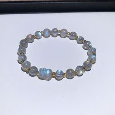 If you’ve ever felt unsure of your place in the world then Moonstone is the crystal you need. It channels the celestial energy of the moon, empowering you to harvest its force and wield it for yourself.While the bracelet’s elegant style is enough to sway trendsetters, it’s only the tip of the iceberg for what it has in store for you! You can use Moonstone for self-discovery. It helps you uncover deeper levels of your character, peeling back life experiences to pinpoint your true purpose. If ther Moonstone Jewelry Bracelet, Diy Bracelets Video, Celestial Energy, Tip Of The Iceberg, True Purpose, Moonstone Crystal, Jewelry Hand, Moonstone Bracelet, Moonstone Beads