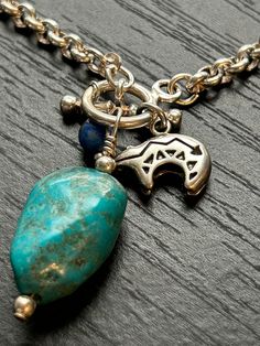 Carolyn Pollack Southwestern sterling  Vintage never worn  Rolo chain Sterling bead Turquoise nugget Lapis lazuli bead Toggle  7 1/2" Southwestern Style Gemstone Jewelry With Round Beads, Artisan Dangle Charms Jewelry, Symbolic Jewelry With Natural Stones For Jewelry Making, Symbolic Sterling Silver Jewelry With Natural Stones, Healing Sterling Silver Charms Jewelry, Unique Blue Charm Jewelry, Southwestern Gemstone Beads Jewelry Gift, Southwestern Nickel-free Jewelry As Gift, Southwestern Silver Jewelry With Natural Stones